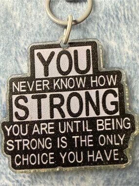 You Never know how Strong Backpack Charm NWT